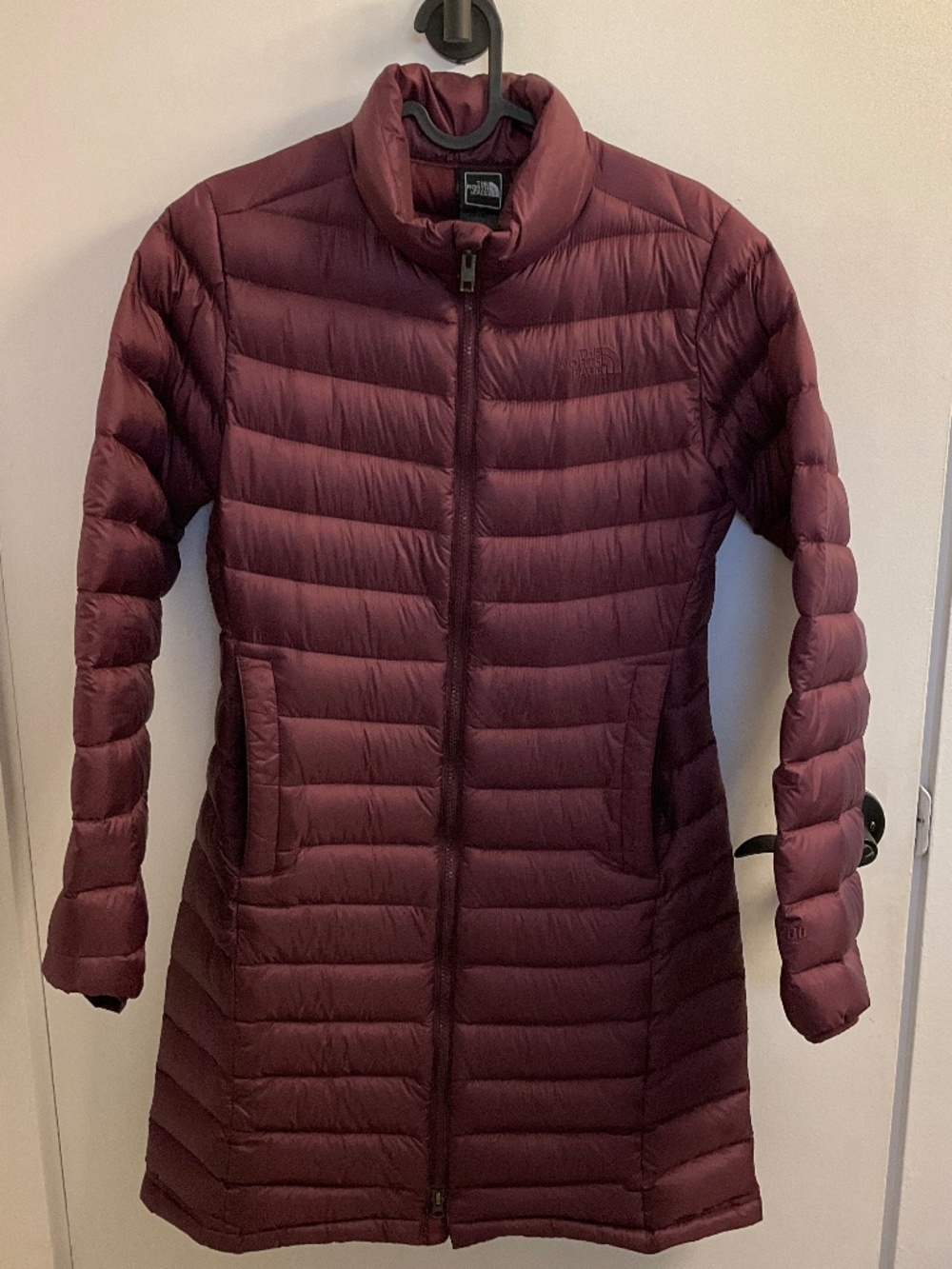 The North Face down puffer full zip jacket in dark purple, size small.